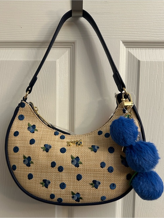 Betsey Johnson Handbags - Betsey Johnson Navy Trim Straw Shoulder Bag with a Blue Pom Pom Charm